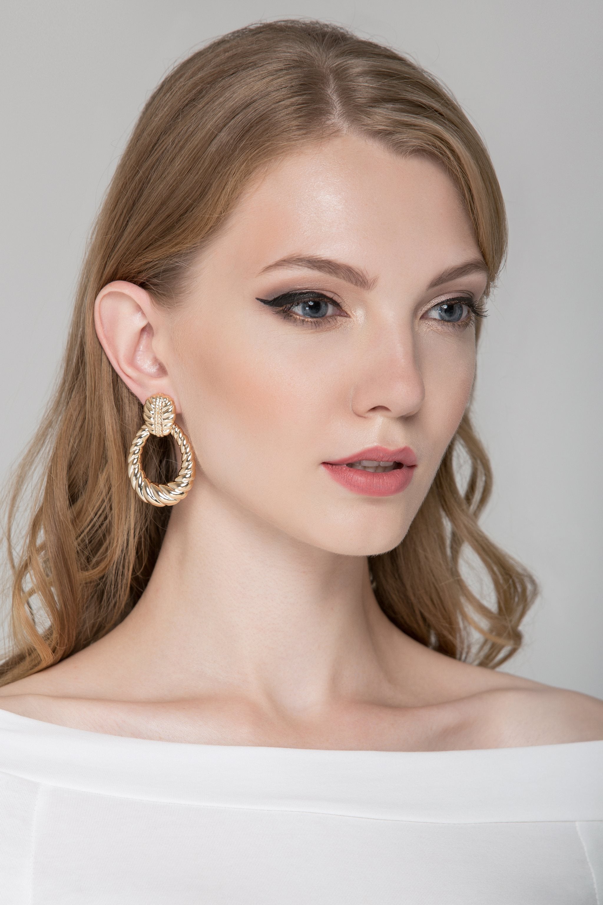 Gold Croissant Earrings